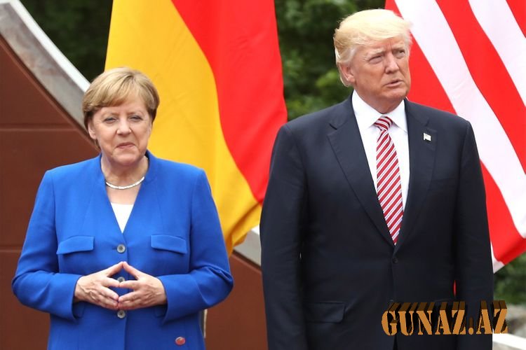 Trampla Merkel arasında mübahisə...