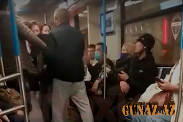 Öskürən və maskasız olan qadın metroda döyüldü - VİDEO