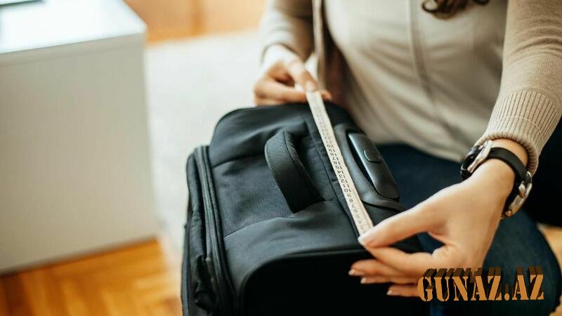 Təyyarənin ayaqyolunda çanta tapdı - Açanda GÖRDÜKLƏRİNƏ İNANMADI