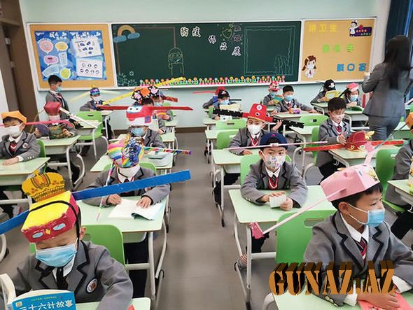 Çin məktəbliləri koronavirusdan belə qoruyur