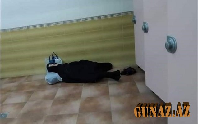 Bakıda keçiddə gecələyən qadın