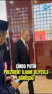 İlham Əliyevlə Putin arasında QISA SALAMLAŞMA-VİDEO